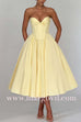 Margovil Strapless Bow Front Corset Swing Midi Dress
