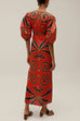 Margovil Knot Front Cut Out Puff Sleeves Side Slit Printed Midi Dress