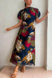 Margovil Puff Sleeve Cut Out Waist Floral Maxi Swing Dress